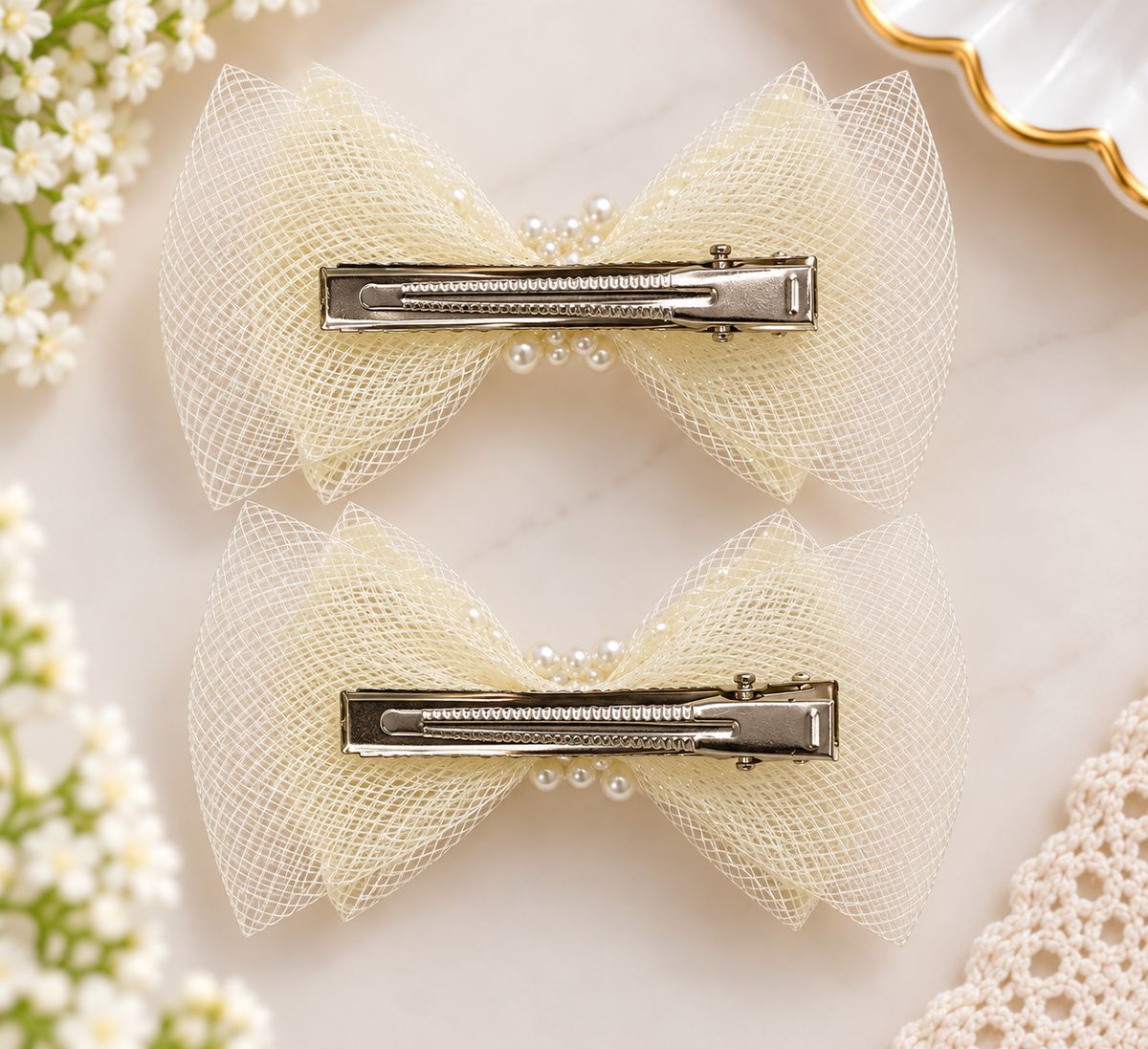 White Dahlia pearl outline bow hair clips Off White